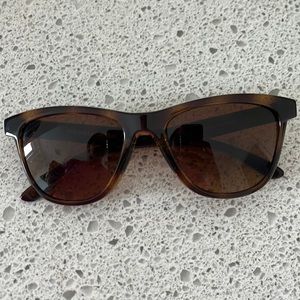 Oakley “moonlighter” sunglasses.